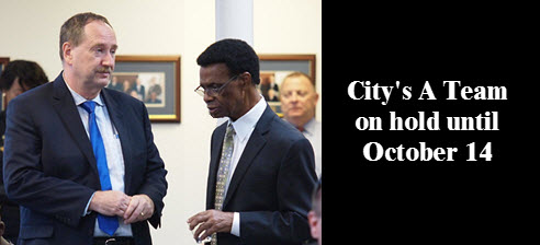 City Manager Joe Helfenberger with Assistant City Manager Vince Akhimie