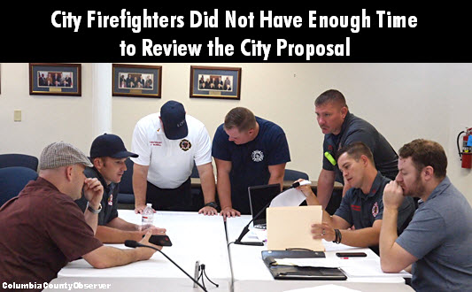 Lake City firefighters caucus during contract negotiations
