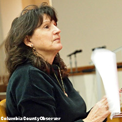 Photo of Marisa Bussey testifying. She was worried about the RV Park expanding.