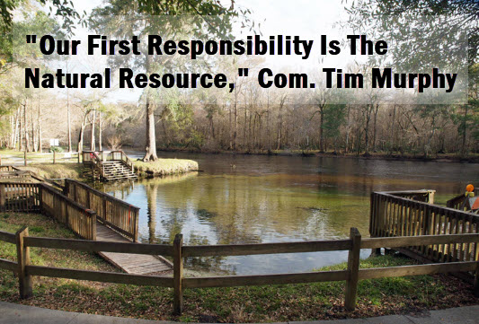 Photo of Rum Island Spring with copy that reads, "Our first responsibility is the natural resourse," Com. Tim Murphy