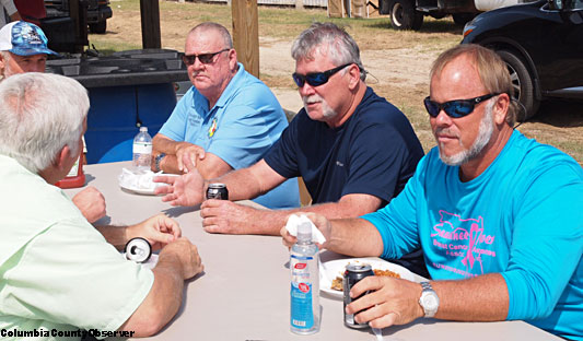 North Florida legend Dale Williams (left) shares conversation with (left to right) Ronnie Frazier, Bucky Nash, Bill Koon, and Robby Hollingsworth.