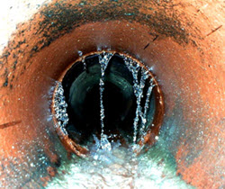 Storm water intrusion into a terracotta sewer pipe.  