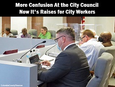 photo of City Council with caption: More confusion at the city counci. Now it's raises for city workers
