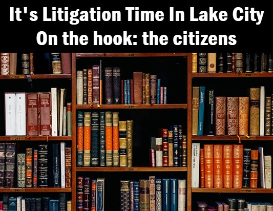 law books with caption: It's litigation time in Lake City. On the hook: the citizens