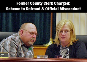 Photo of Commissioner Rocky Ford and Deputy Clerk Katrina Vercher in 2019 with caption: Former County Clerk Charged: scheme to defraud and official misconduct