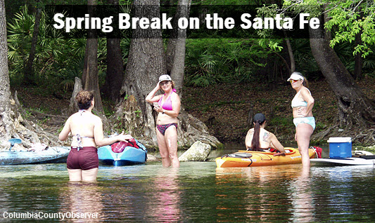 Kayakers taking a spring break on the Santa Fe river
