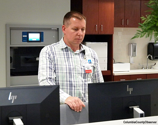 ER Director Brian Sellers, RN, at one of the two IT stations in the ER.
