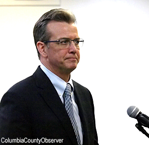 Michael Cavendish listens to the Lake City City Council