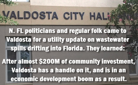 Photo of Valdosta city hall annex with copy: N. FL politicians and regular folk came to Valdosta for a utility update on wastewater spills drifting into Florida. They learned: After almost $200M of community investment, Valdosta has a handle on it, and is in an economic development boom as a result