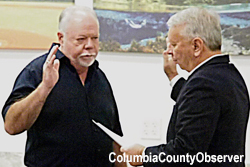 Jock Phelps takes the oath of office